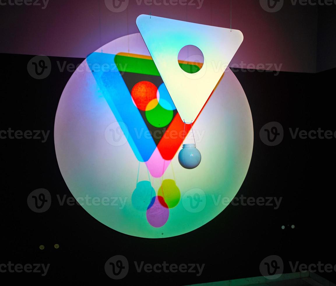 Optical hologram of the primary colors of the spectrum with triangle and sphere photo