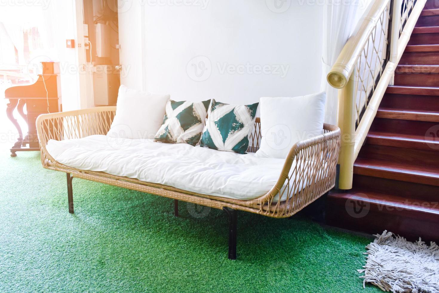 Home interior decoration with plastic rattan and pillows. photo