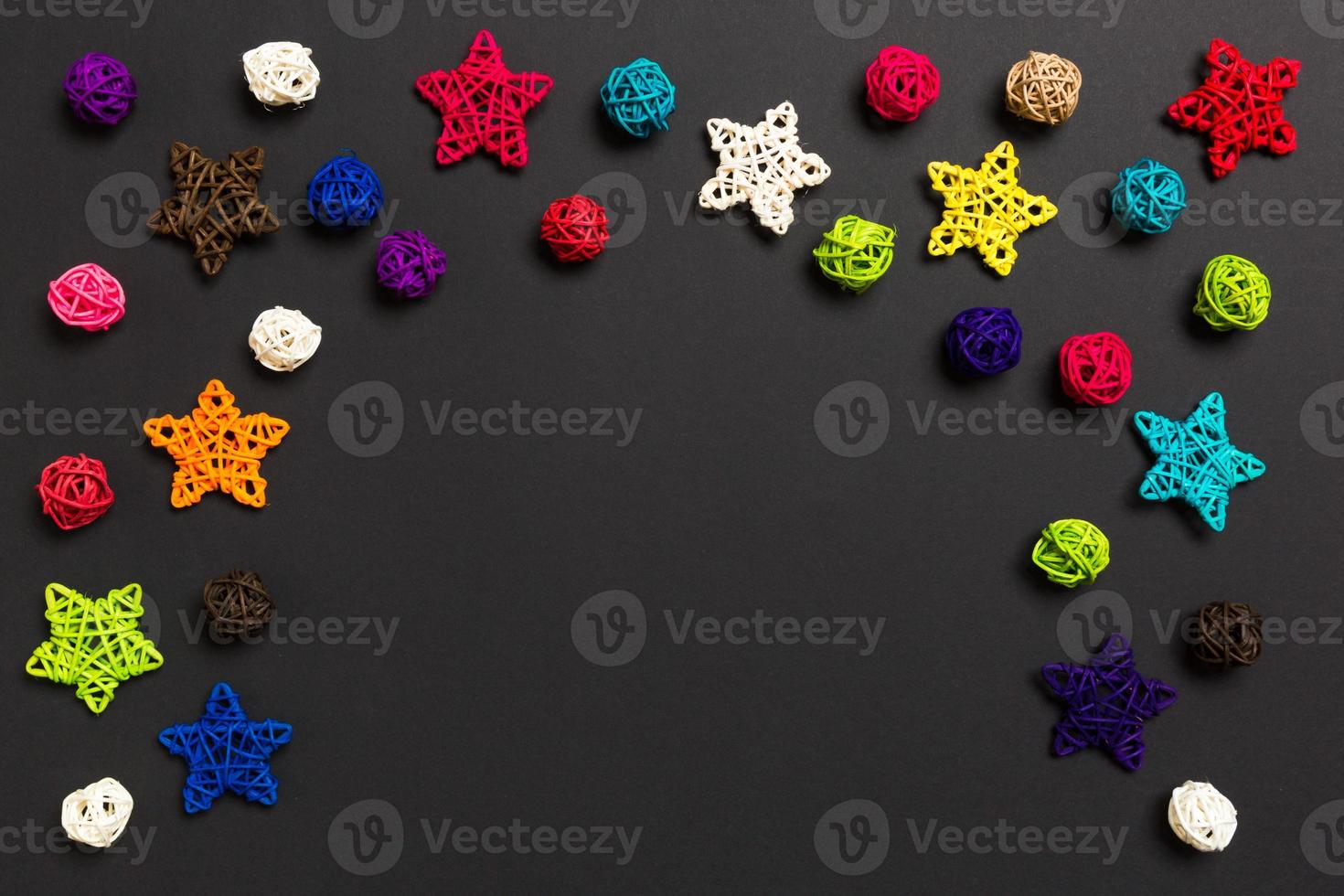 Top view of Christmas decorations on black background. New Year holiday concept with copy space photo