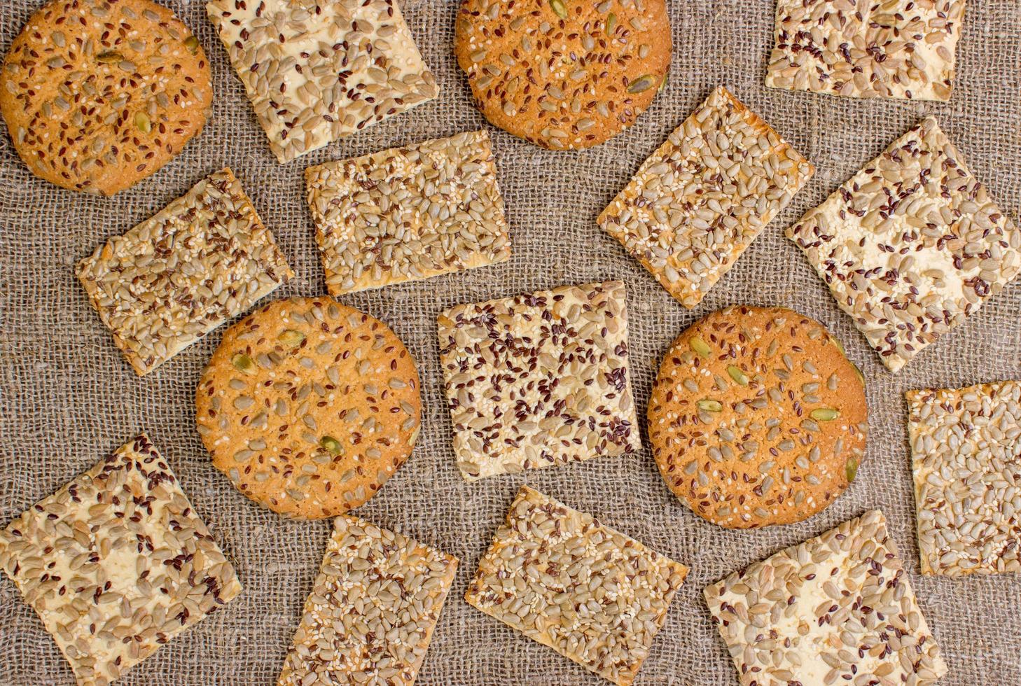Rows of various shortbread and oat cookies. photo