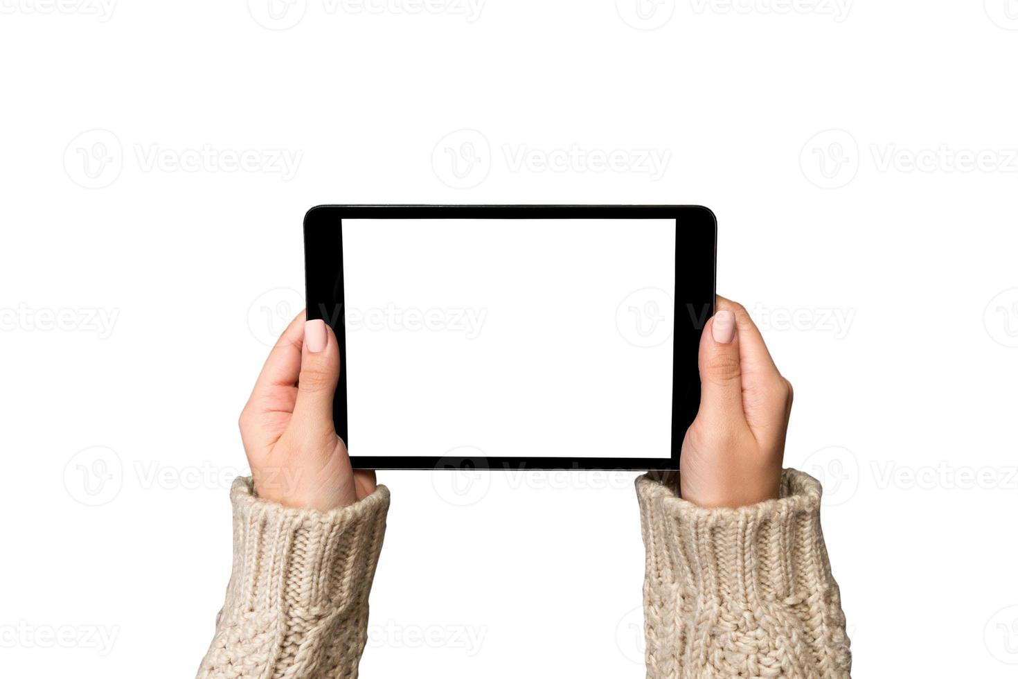 woman hands using tablet computer isolated on bachground. cristmas shopping time. Happy Christmas mock up background, top view photo