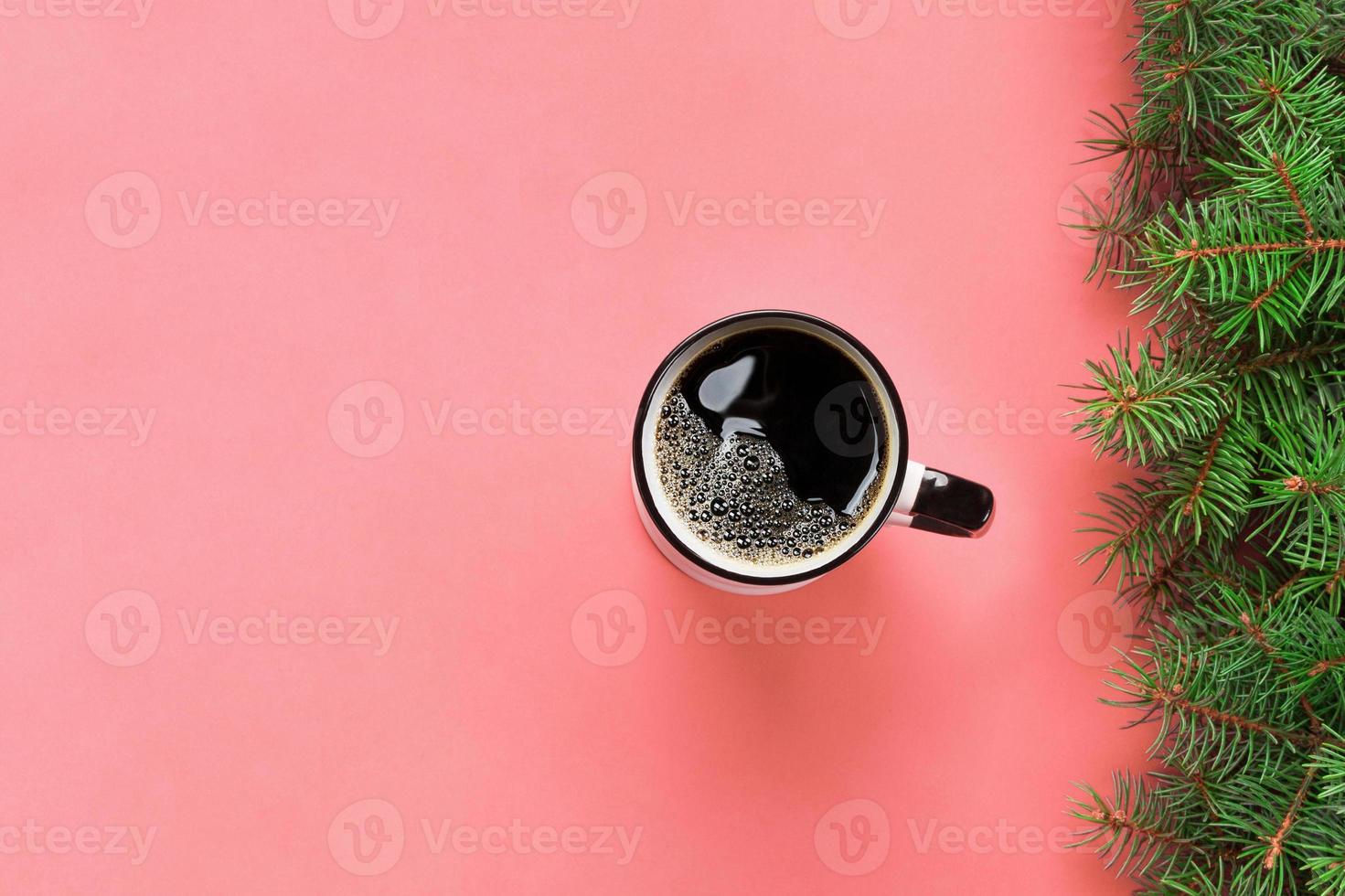High angle of woman hands holding coffee mug on pink background Minimalistic style. Flat lay, top view isolated photo