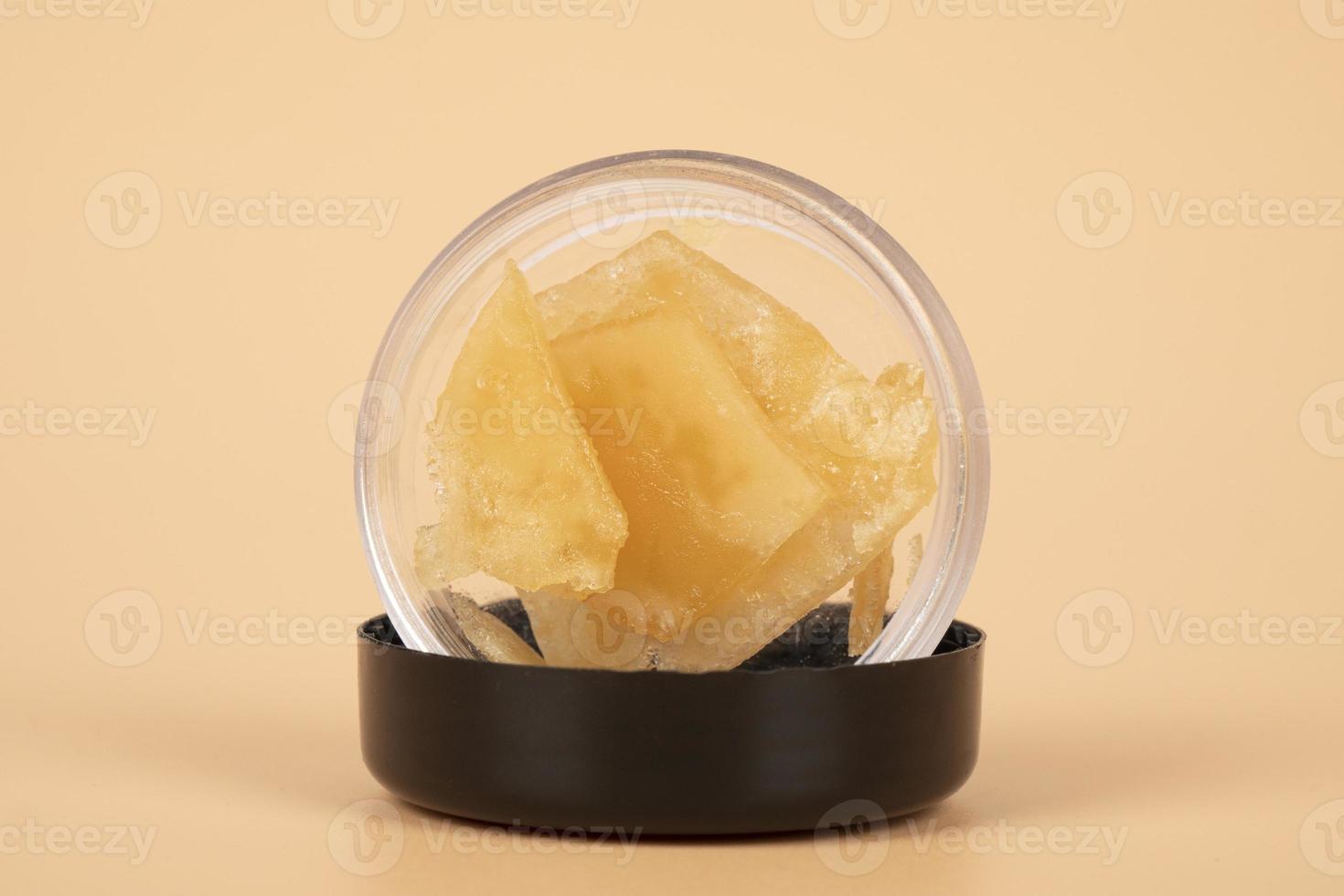 box with golden resin wax with a high thc content photo