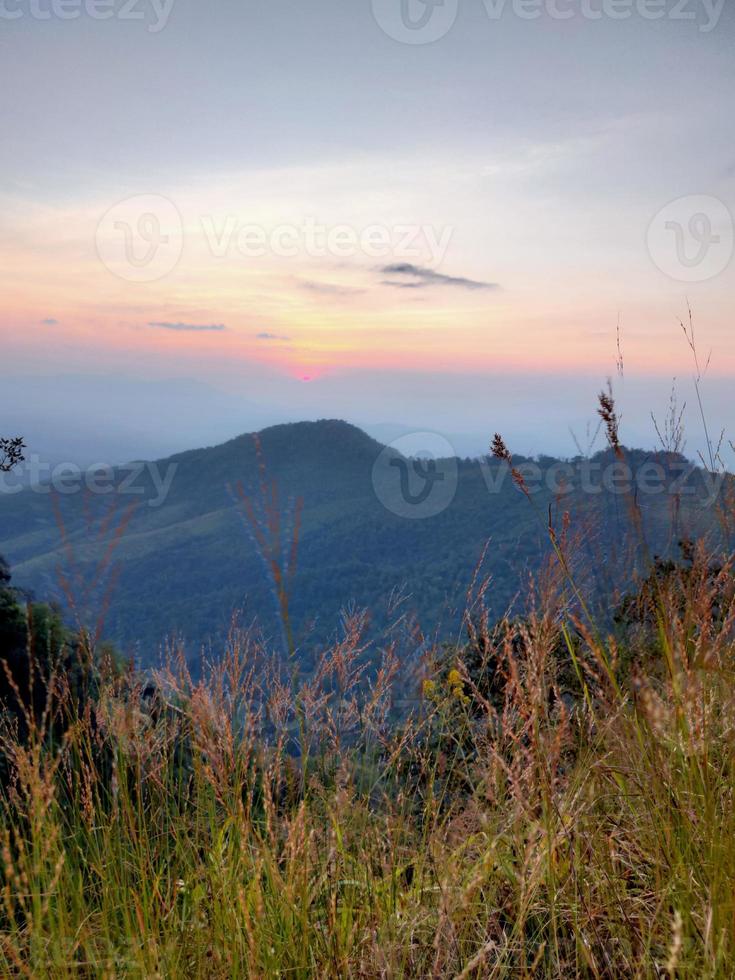 Mountain valley during sunrise. Natural summer landscape photo