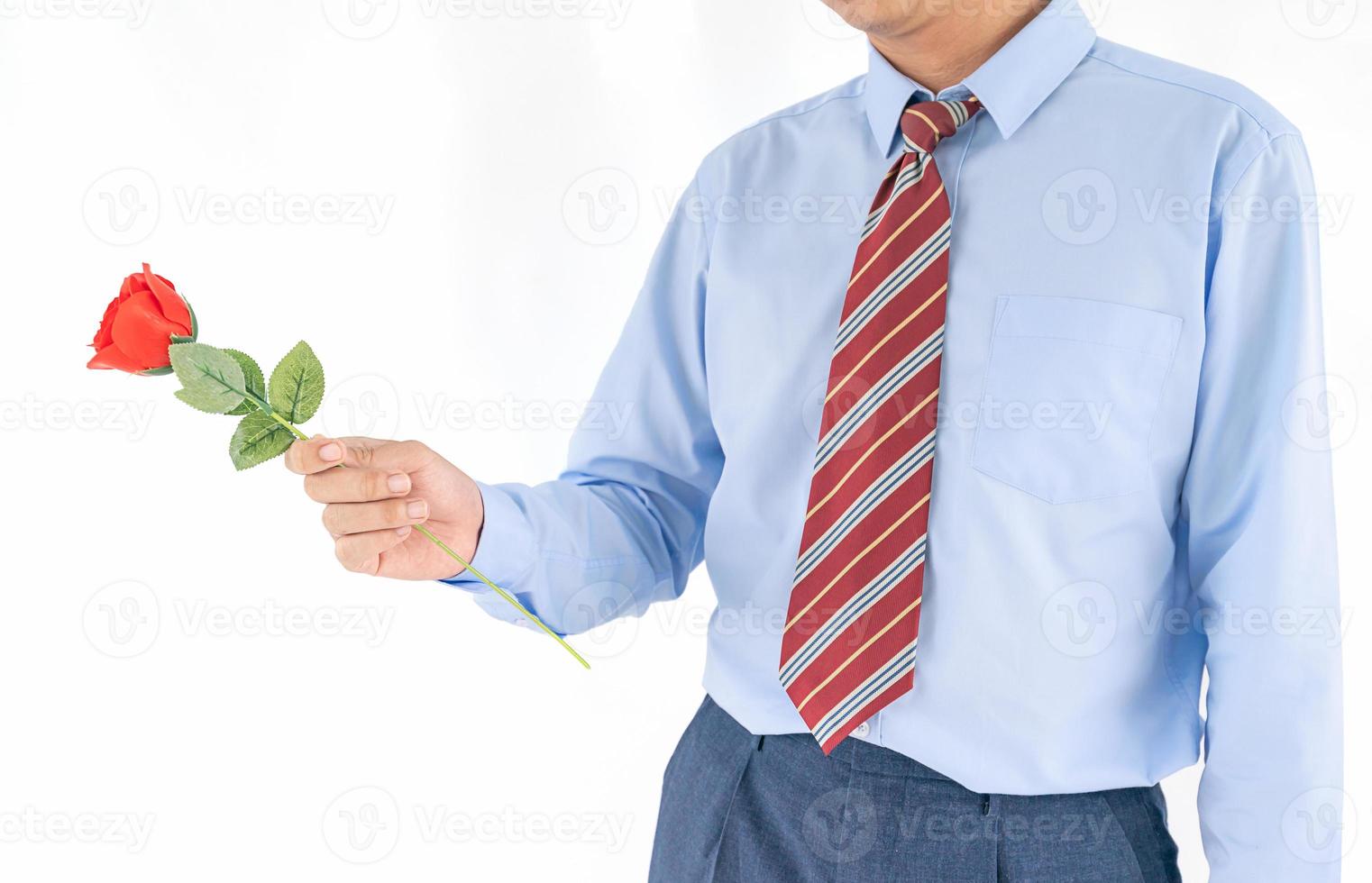 Man holding with red rose on white background photo