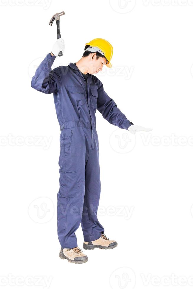 Handyman in uniform with his hammer 13627413 Stock Photo at Vecteezy