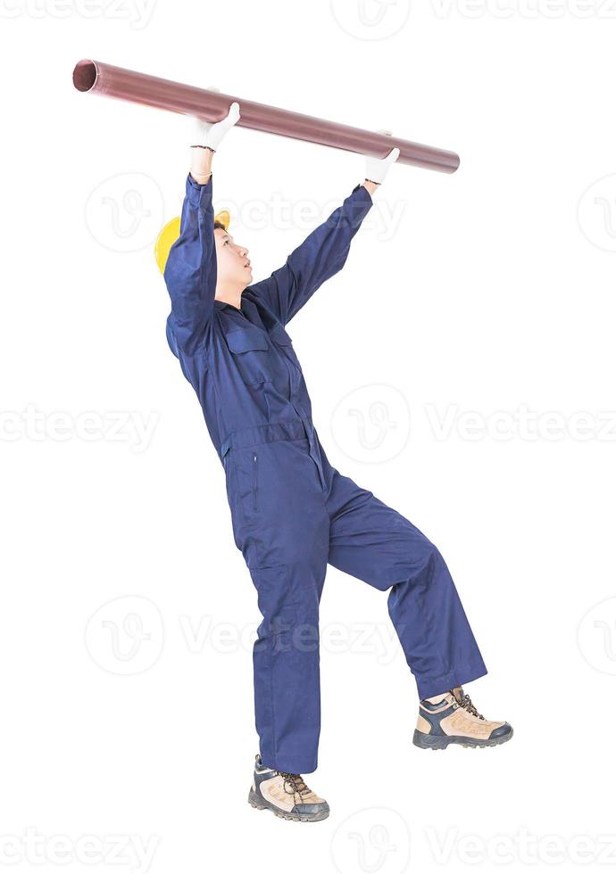 Plumber in uniform holding pvc pipe with clipping path photo