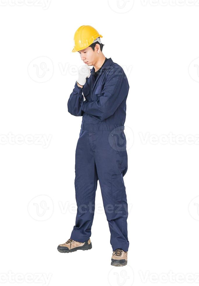 Workman with blue coveralls and hardhat in a uniform with clipping path photo