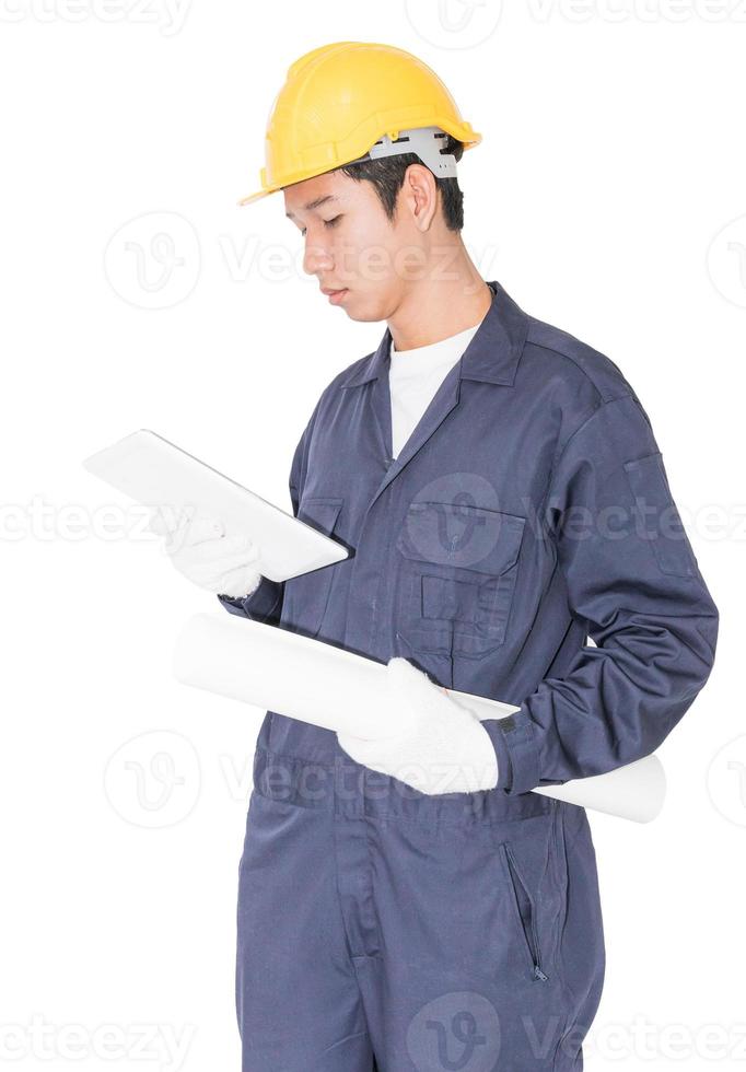 Worker using a tablet and holding blueprint on white photo