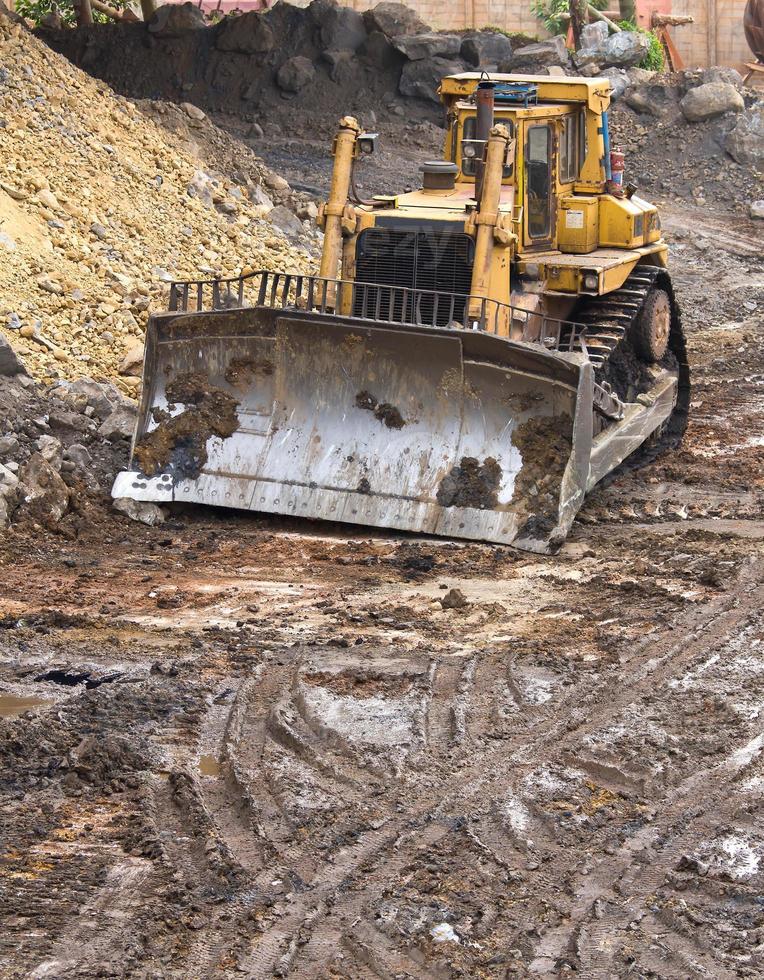 Bulldozer machine on site photo