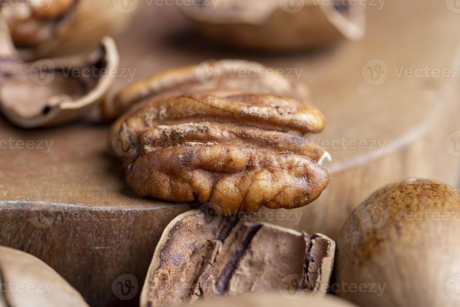 Pecan in a shell on the table photo