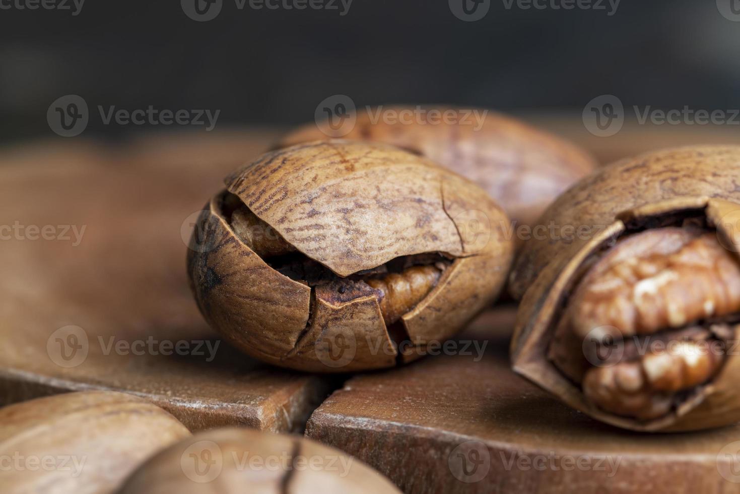 Pecan in a shell on the table photo