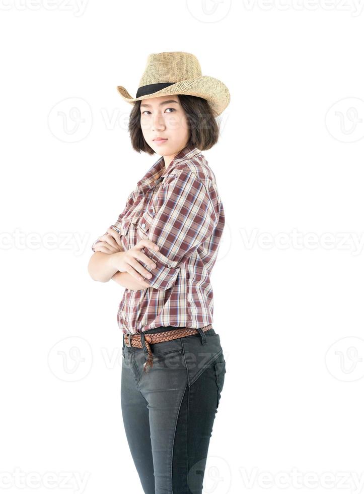 Young woman in a plaid shirt and arms crossed photo