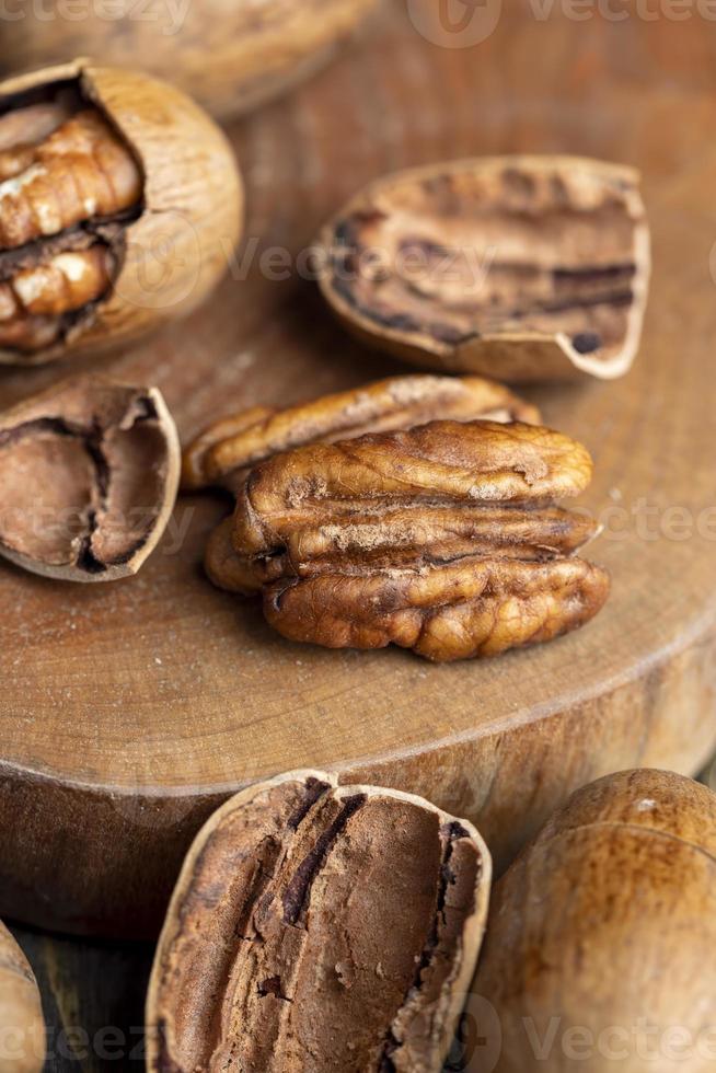 Pecan in a shell on the table photo