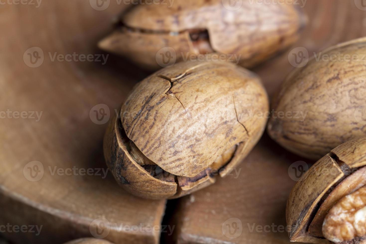 Pecan in a shell on the table photo