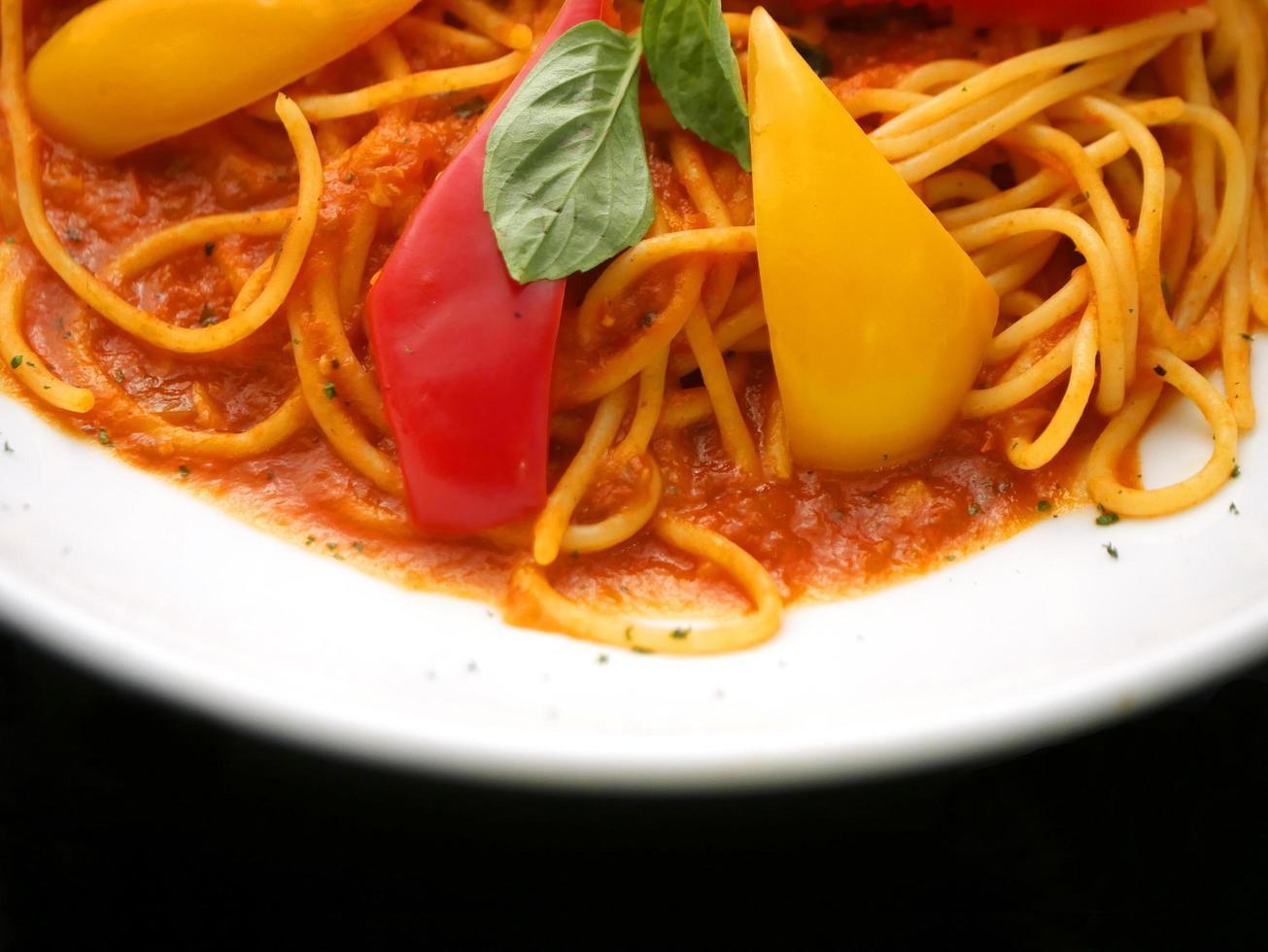 Spagetti decorate with sweet pepper photo