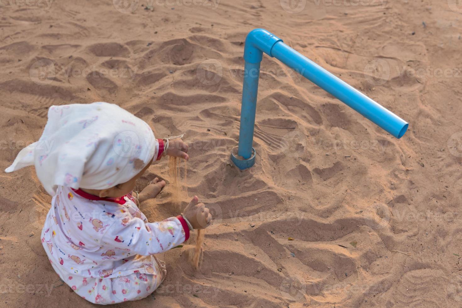 The children enjoyed playing in the sand at home. Concept for enhancing intellectual development. photo