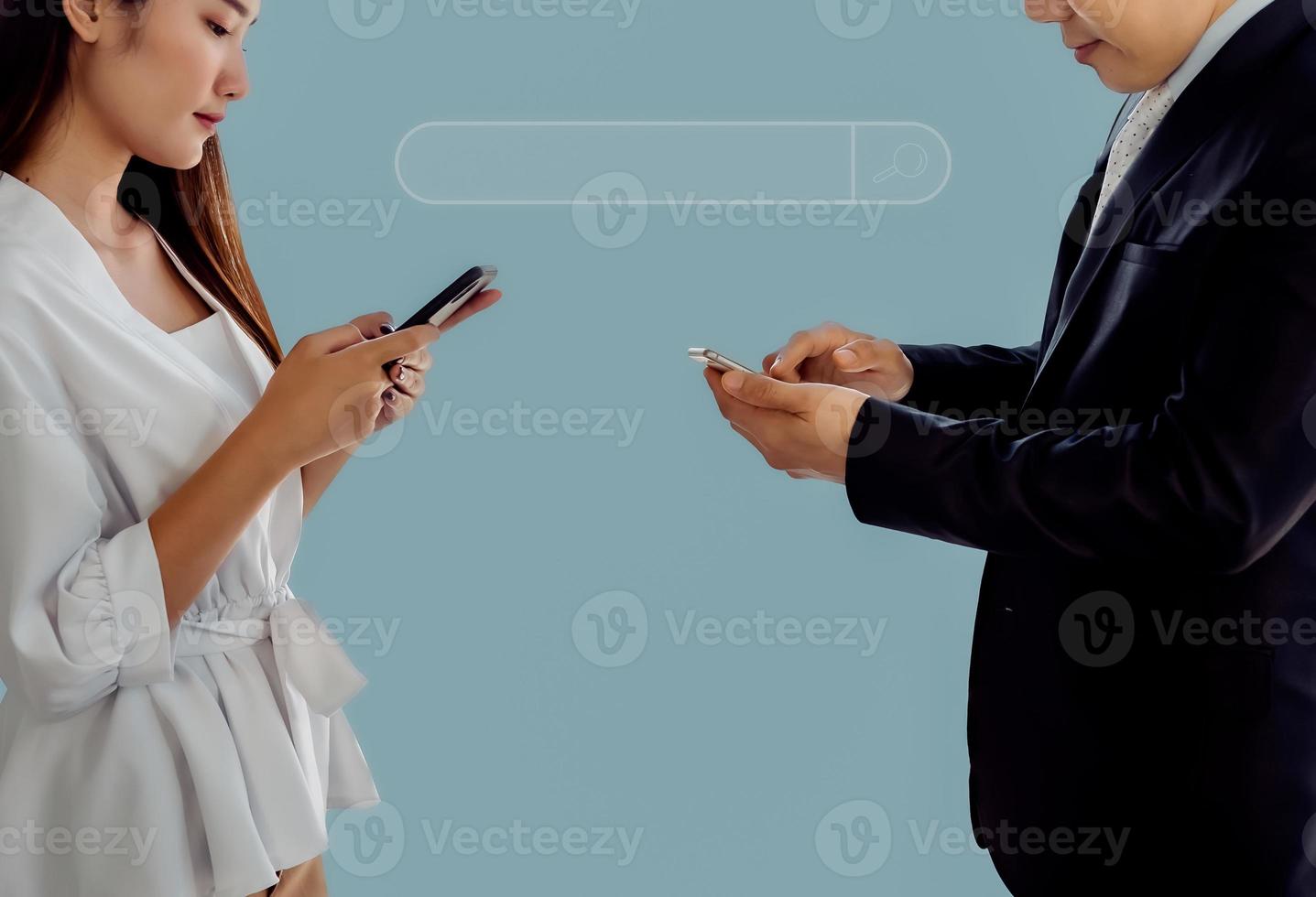 Social media community concept, Business people using smartphone searching information from internet and contact customer, isolated on light blue background. photo