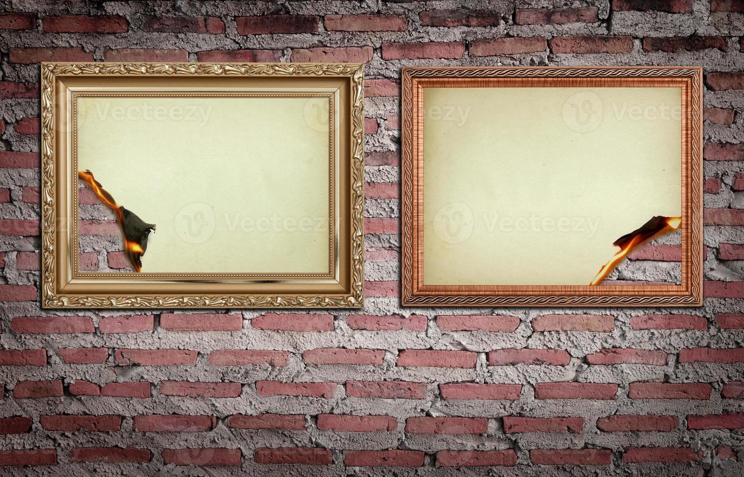 vintage gold frame with burned on wall  background photo