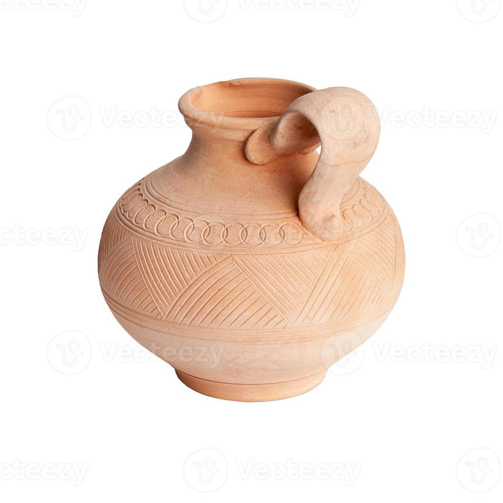 A brown clay jug isolated on a white background photo
