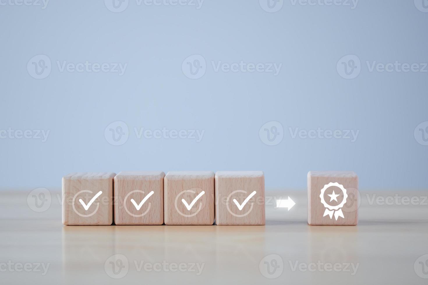 Checklist and sign of the top service Quality assurance on wooden blocks. Guarantee, Standards, ISO certification, standardization concept, advertising product and service quality commitment. photo