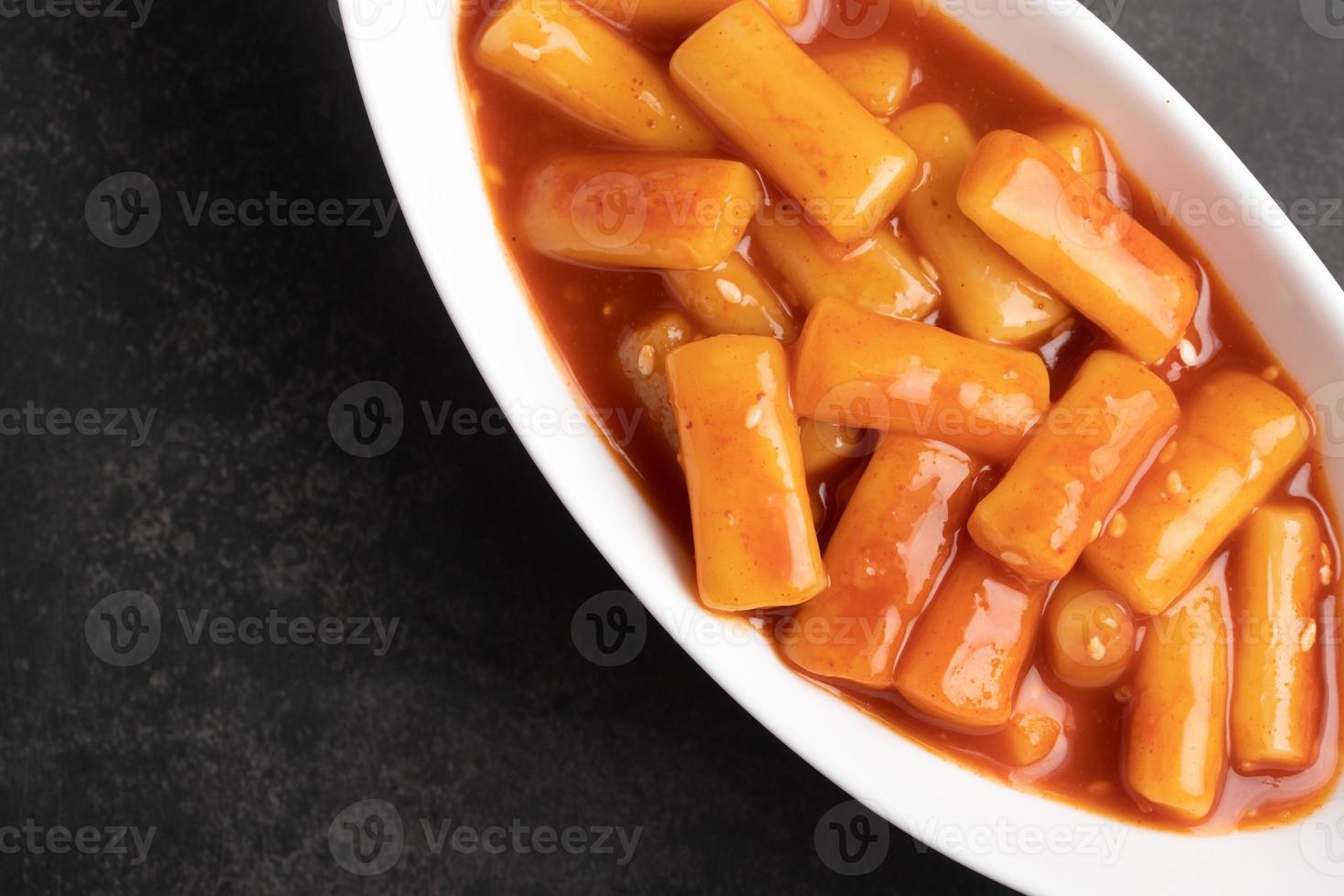 deep fried Korean rice cake tteokbokki, spicy tteokbokki, Korean style food. photo