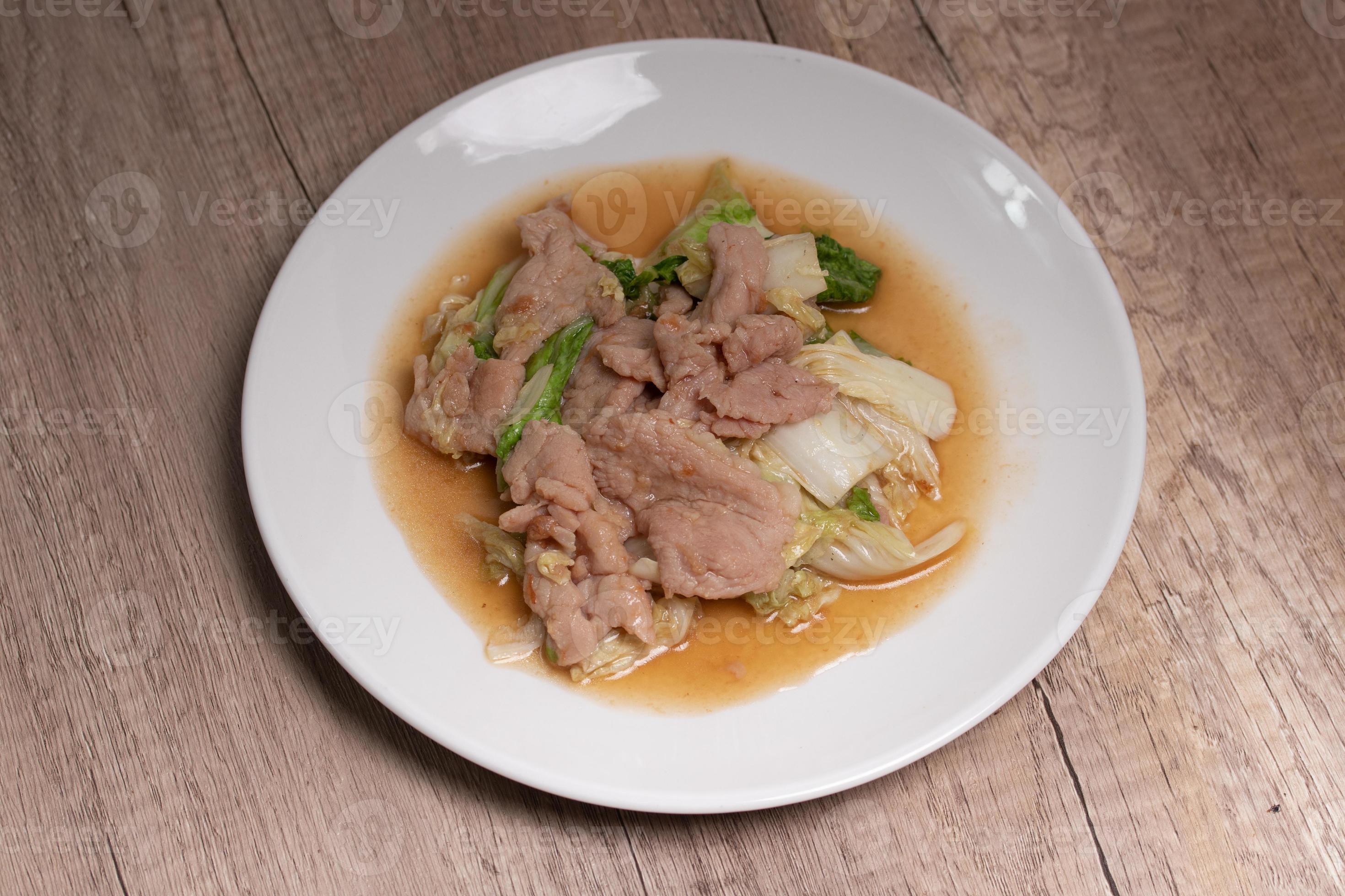 Stir Fried Cabbage with Pork in a White Plate 13630384 Stock Photo at