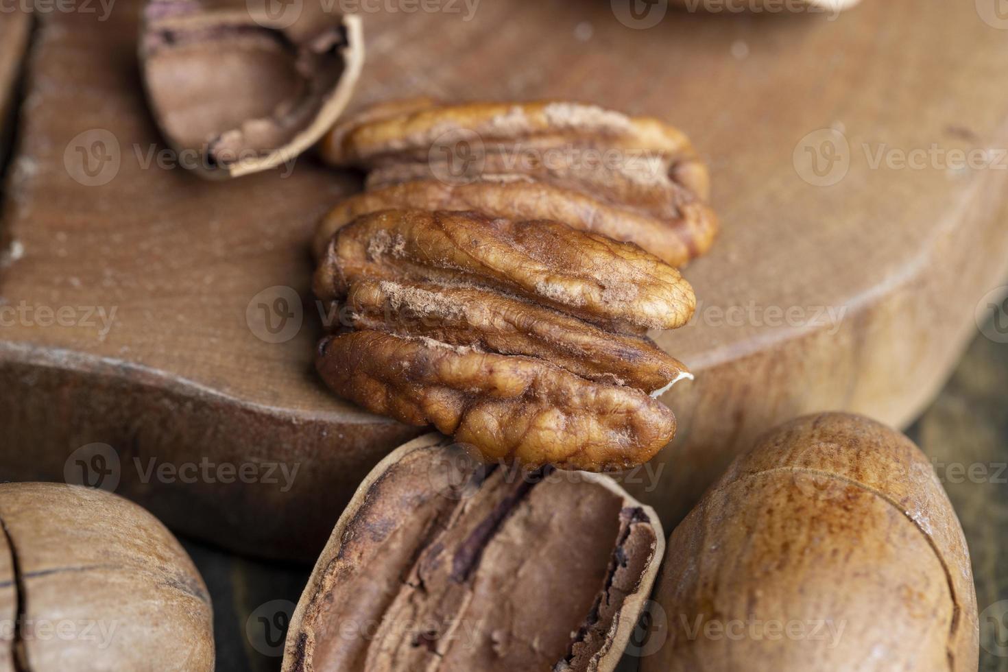 Pecan in a shell on the table photo