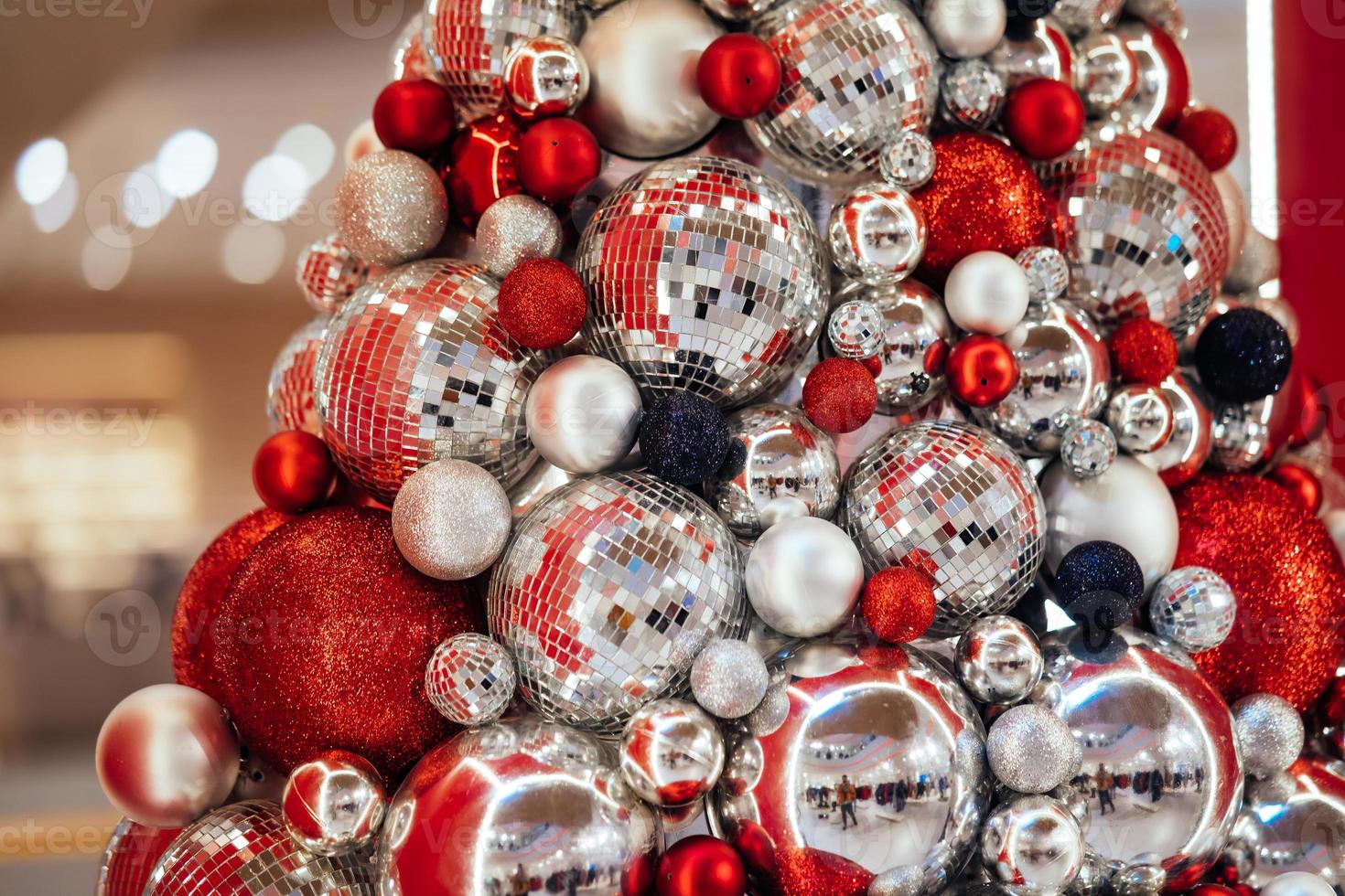 Christmas tree made of bauble decoration. New year concept. photo