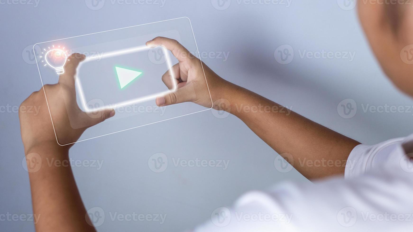 Educational concept picture. A girl stands holding an education icon representing creativity and innovation. Guidelines for searching for educational information. copy space photo