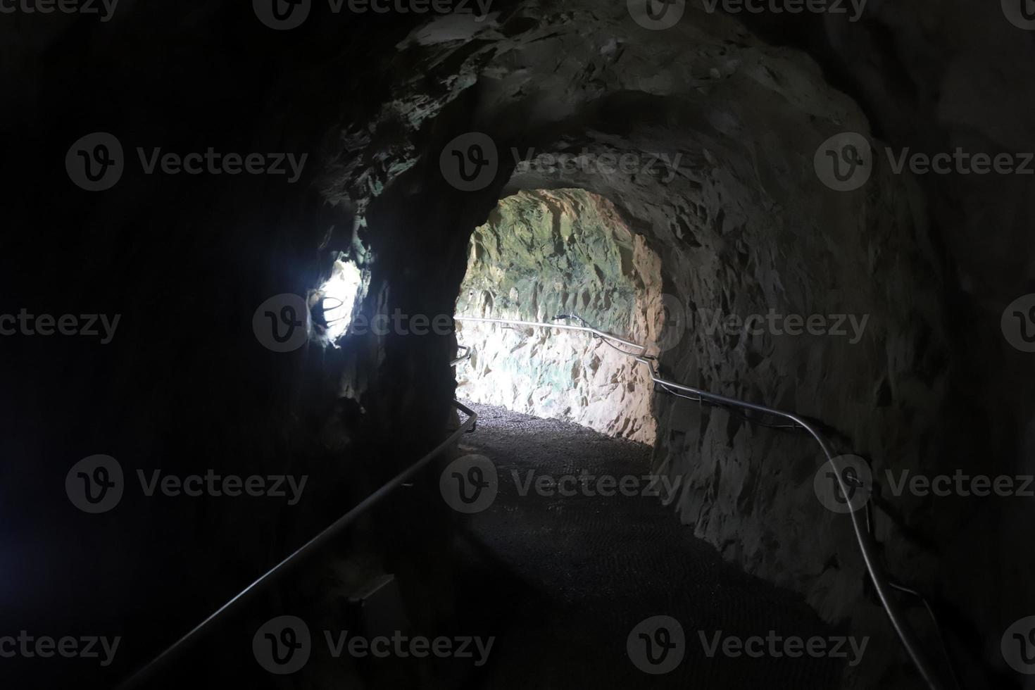 Grottoes in the chalk cliffs on the shores of the Mediterranean Sea. photo