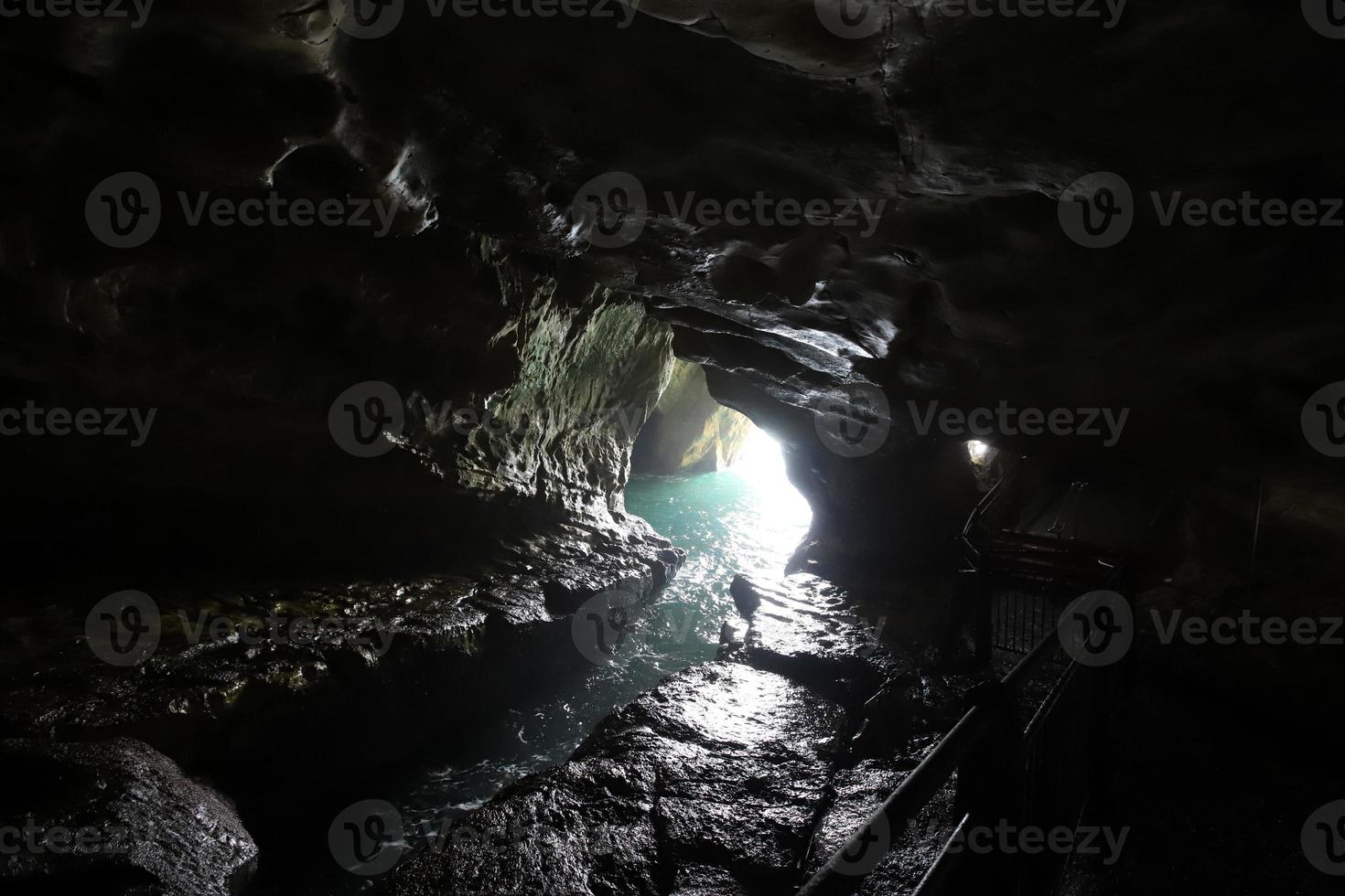 Grottoes in the chalk cliffs on the shores of the Mediterranean Sea. photo