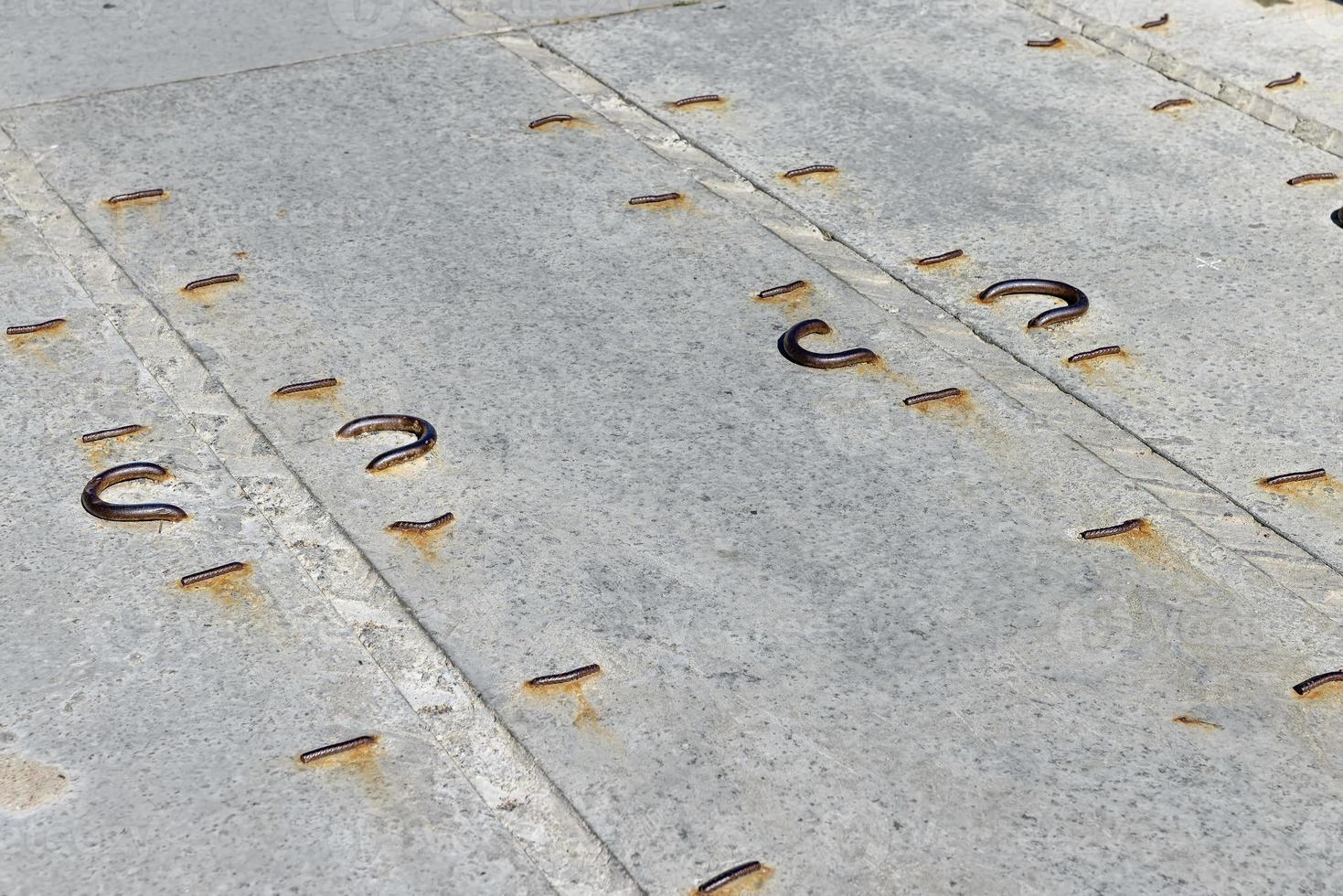 Temporary road made of concrete slabs on a construction site photo