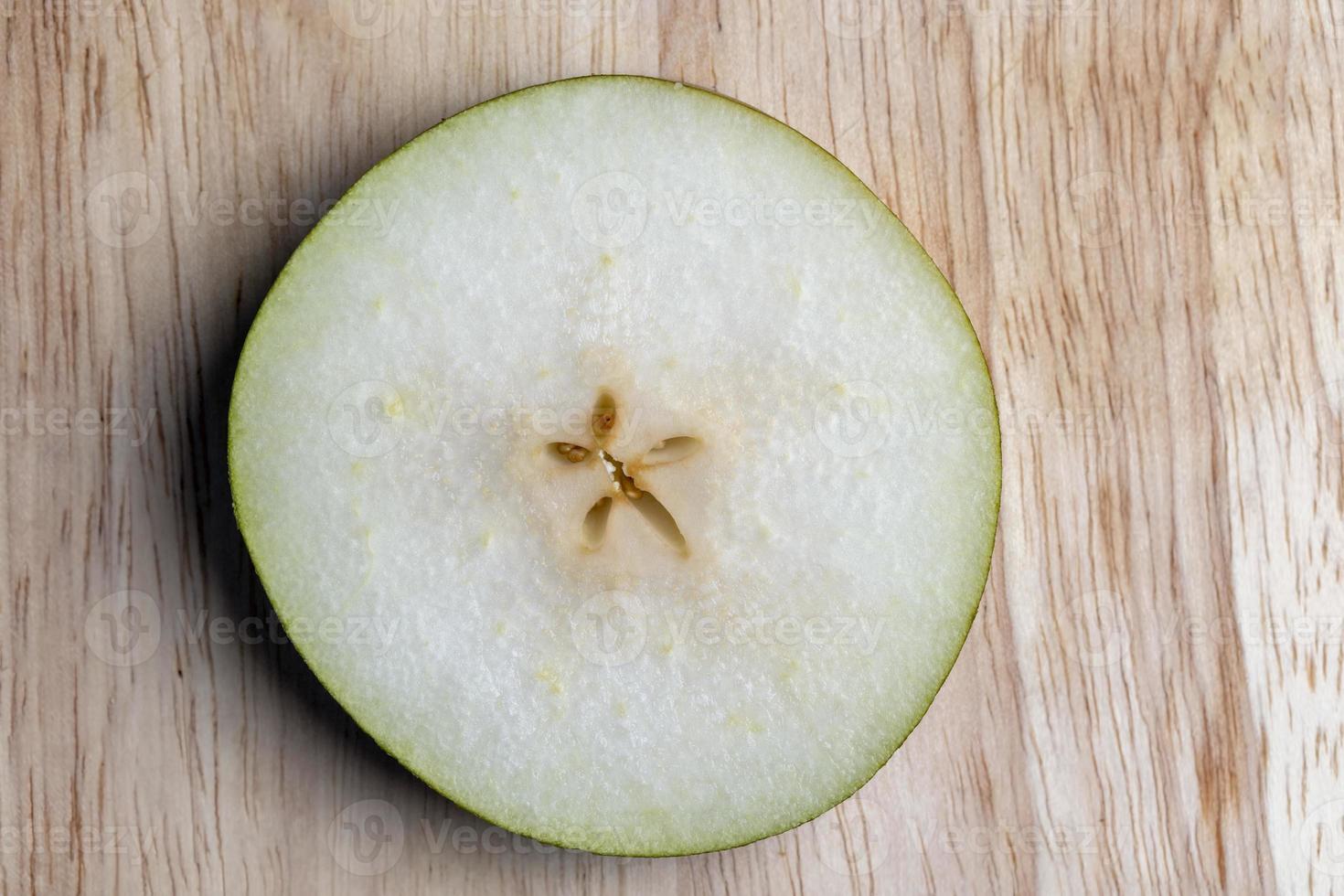 Sliced pear on the table photo
