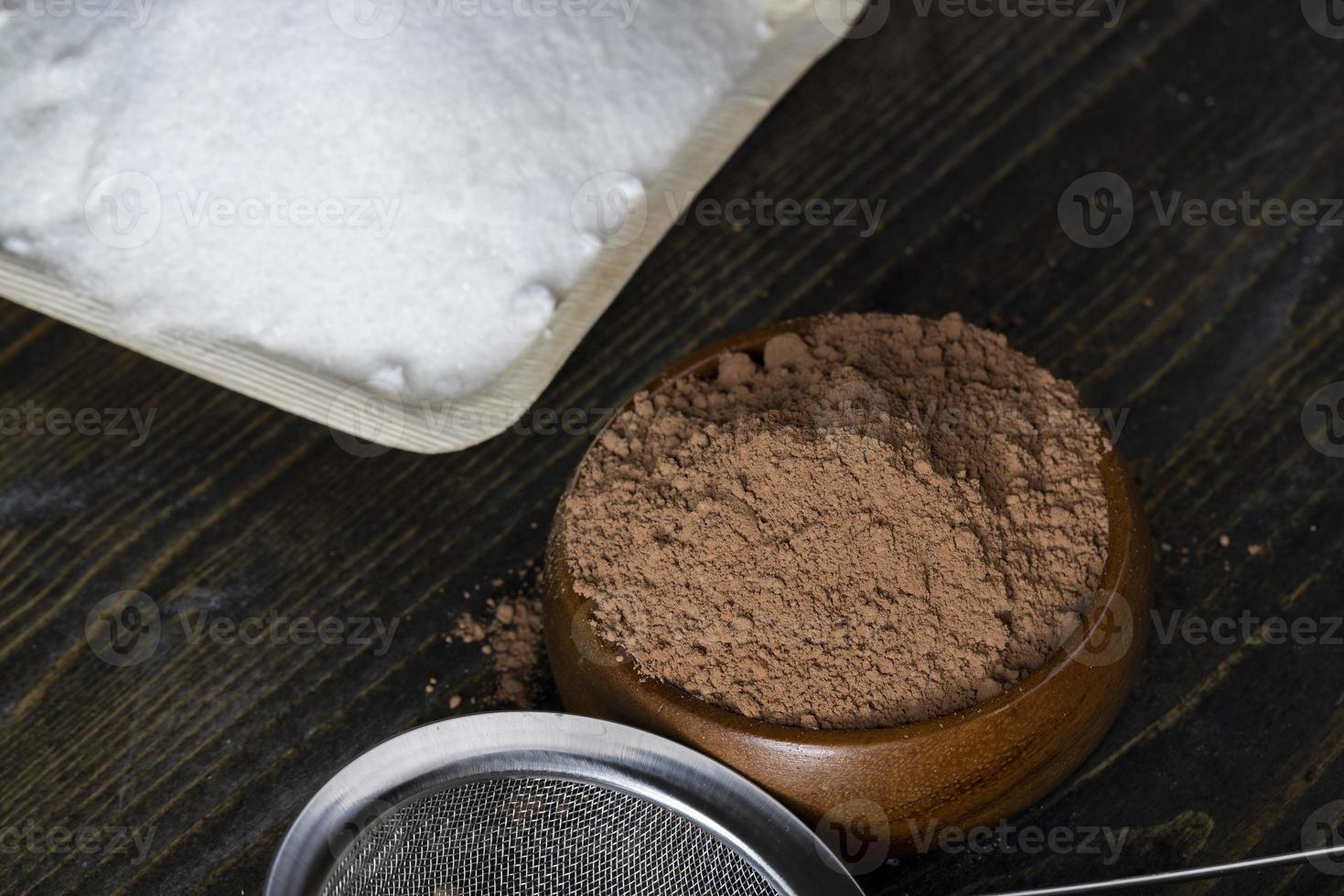 crumbly powder from cocoa beans photo