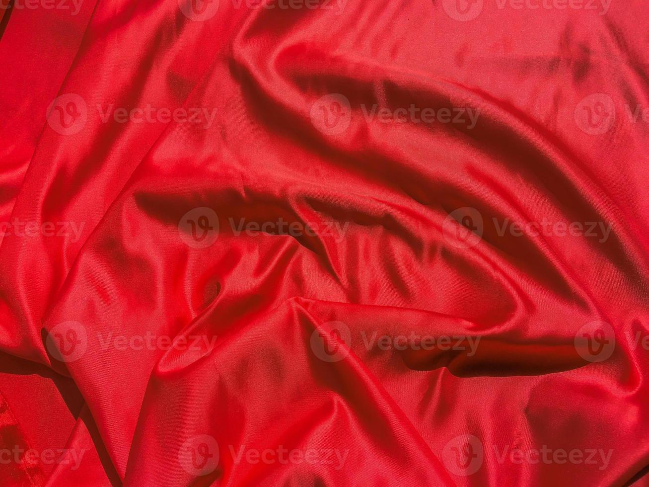 Red fabric texture for backgroundwith coy space. Valentines Day or Christmas Day wallpaper design photo