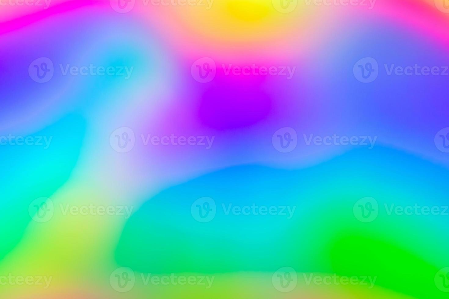 Abstract blur holographic rainbow foil iridescent background photo