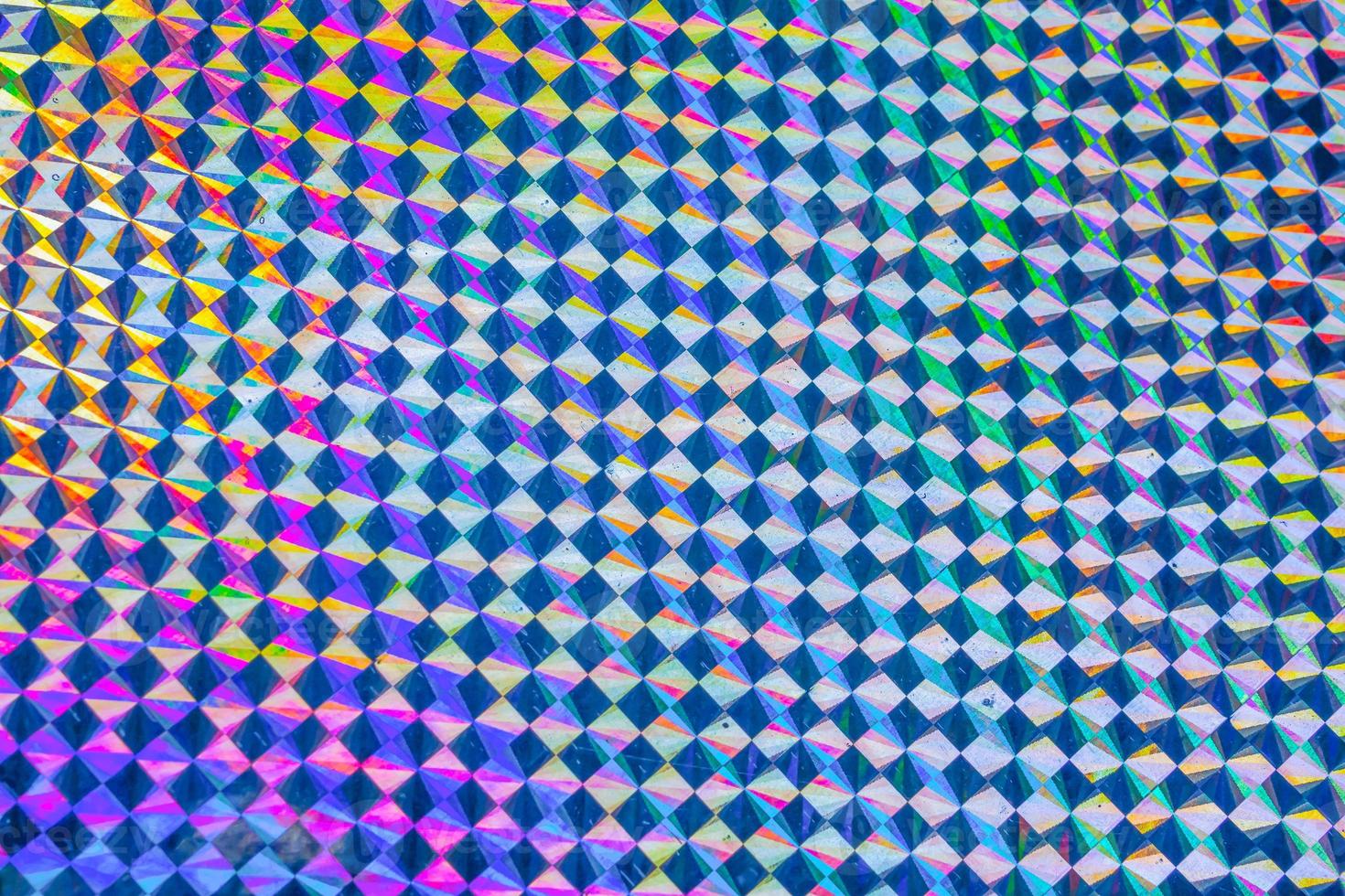Holographic rainbow foil iridescent texture abstract hologram background photo