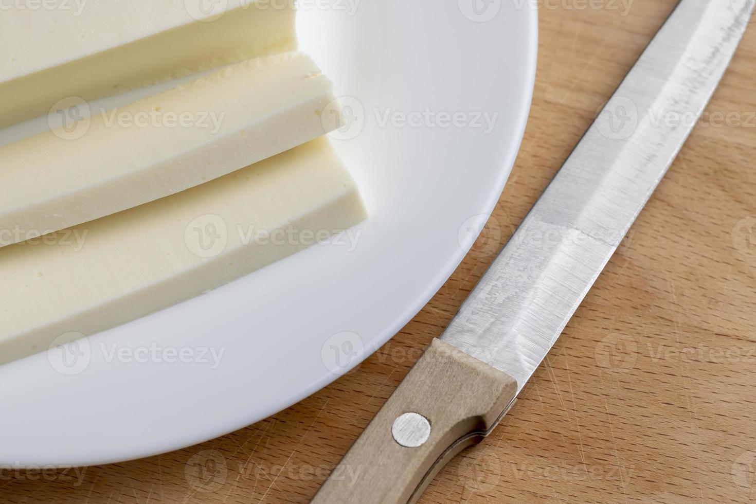 Sliced cream cheese for salads photo