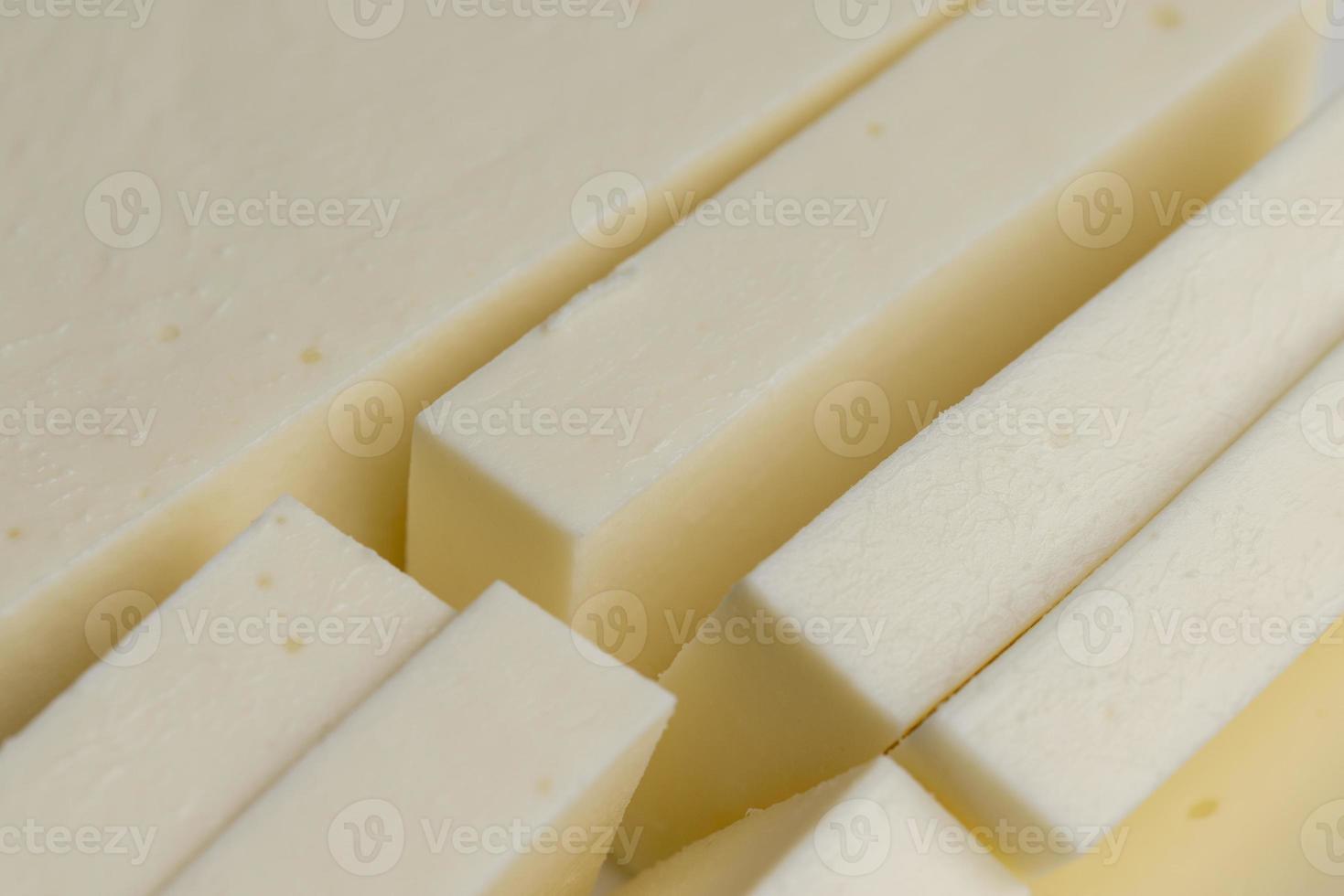 Sliced cream cheese for salads photo