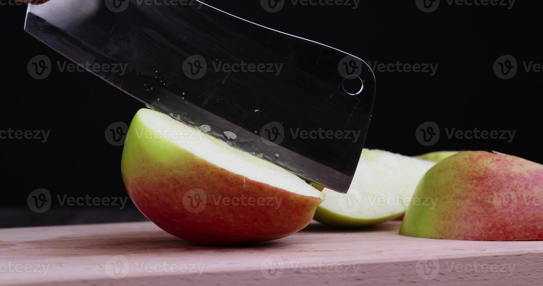 Sliced ripe apple on a cutting board photo