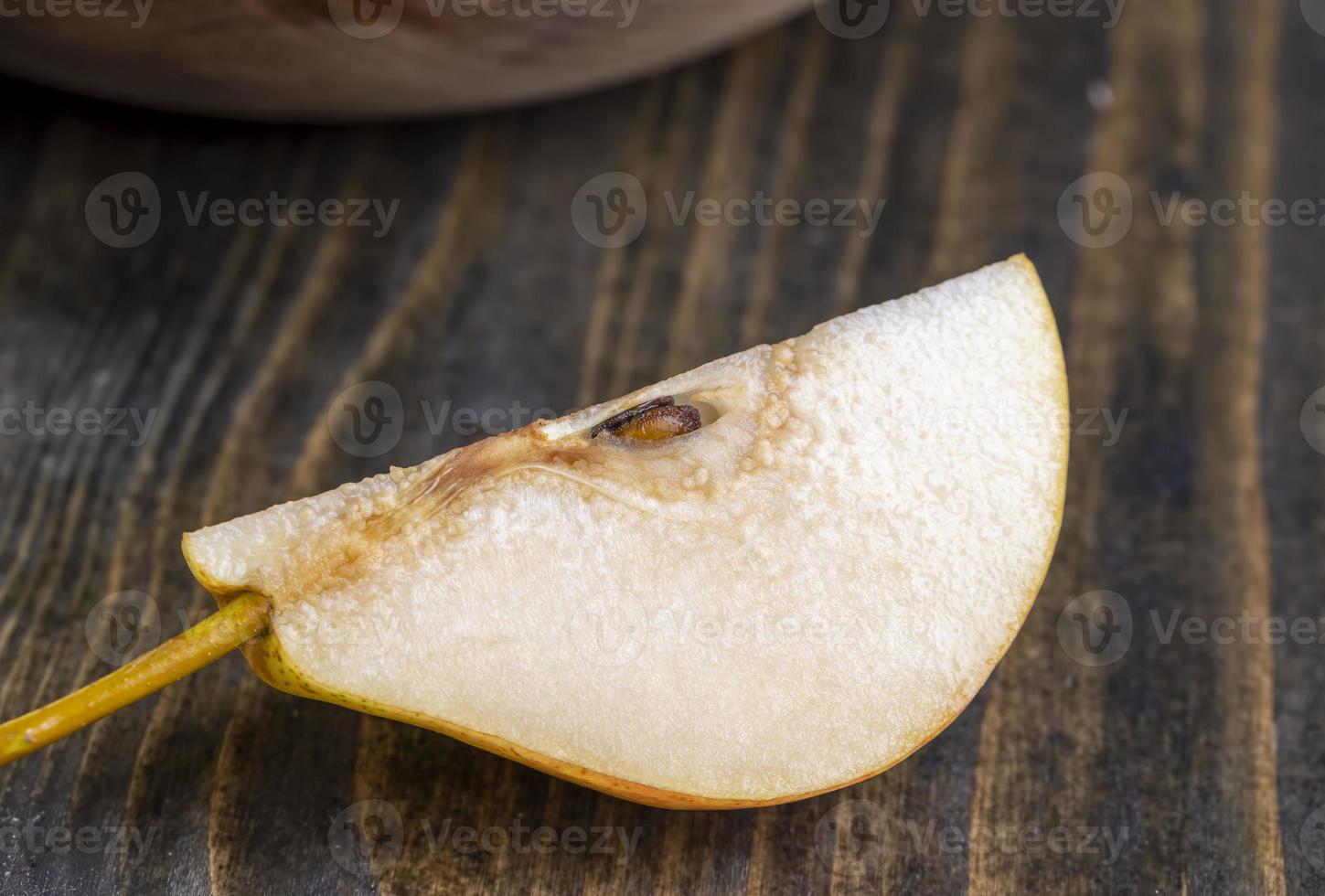 Sliced pear on the table photo