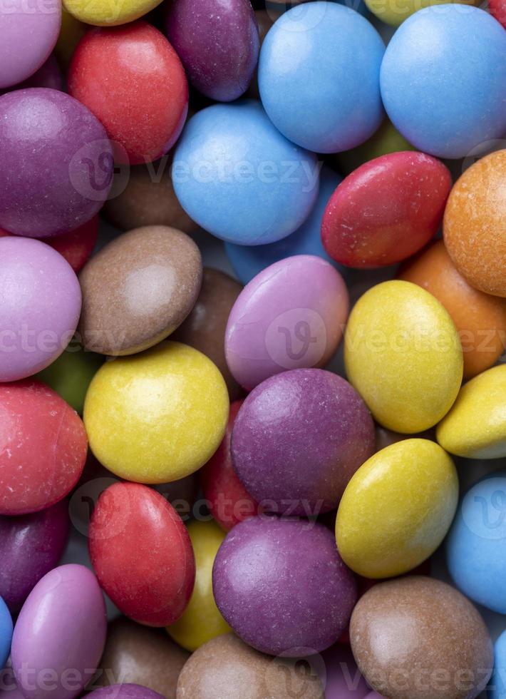 Multicolored chocolates with chocolate filling photo