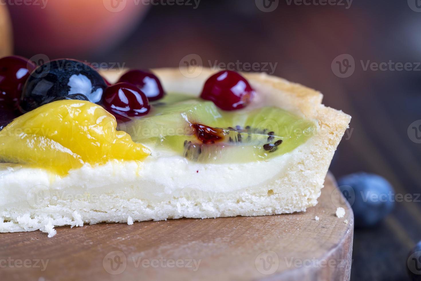 delicious cake with different berries photo