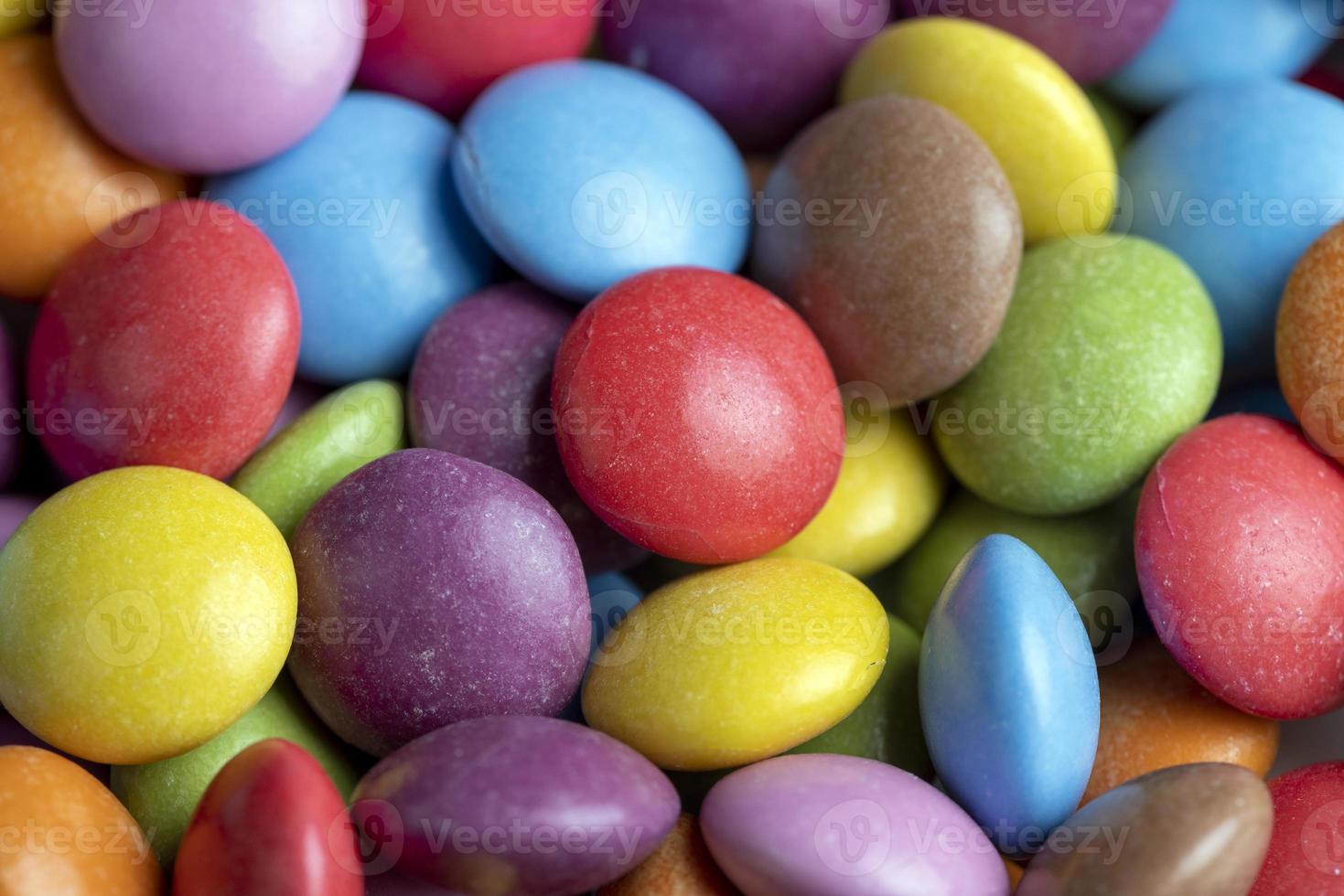 Multicolored chocolates with chocolate filling photo