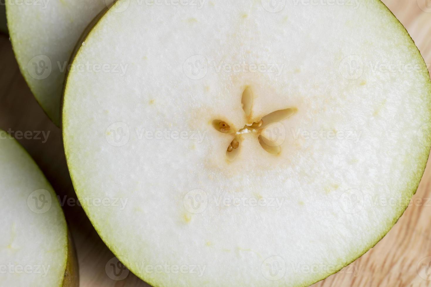 Sliced pear on the table photo