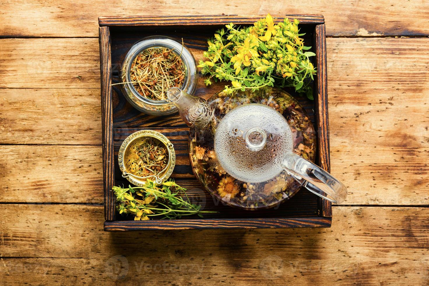 Hypericum in herbal medicine,wooden table photo