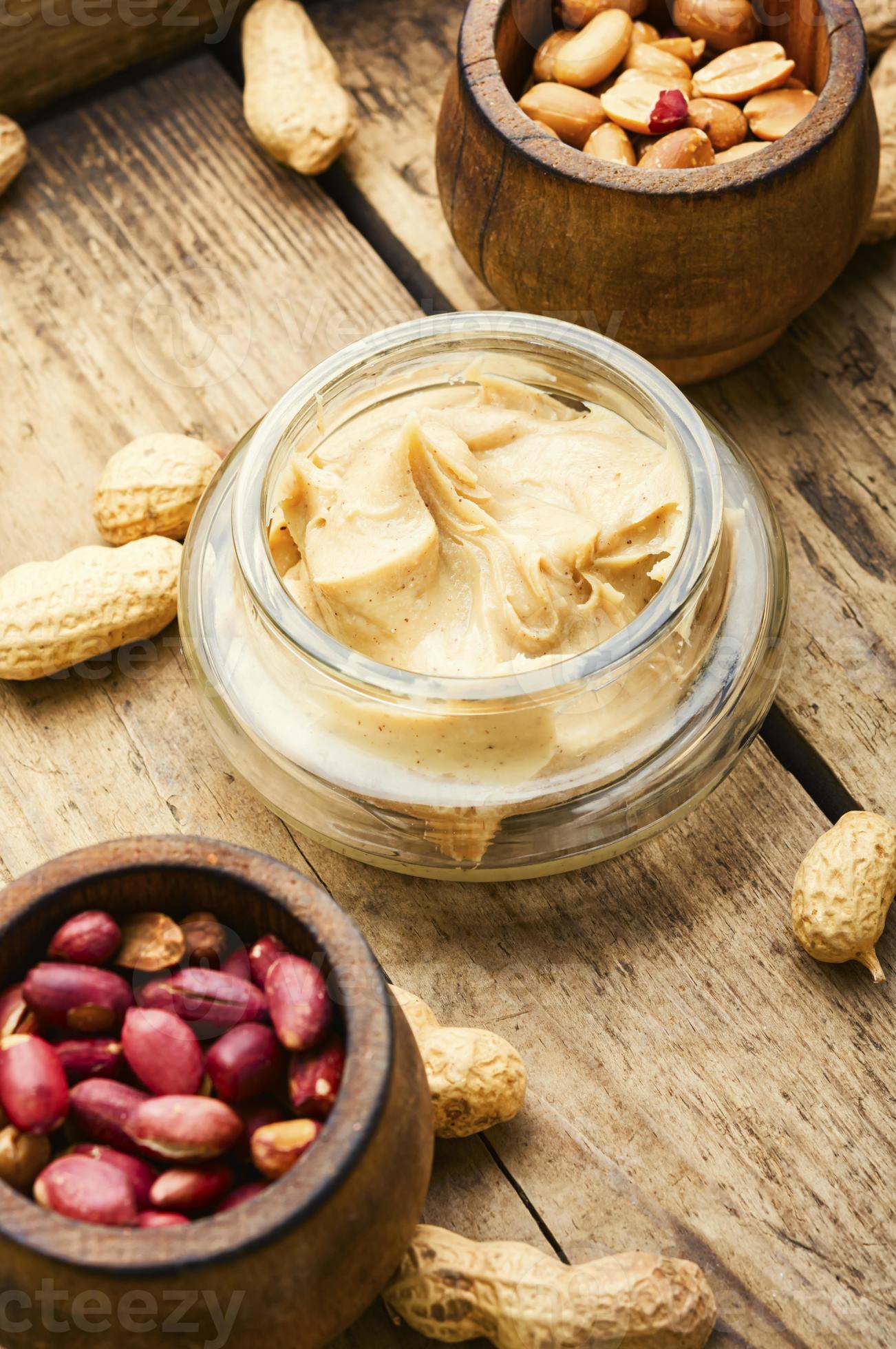 Homemade peanut butter on retro wooden table 13664713 Stock Photo at