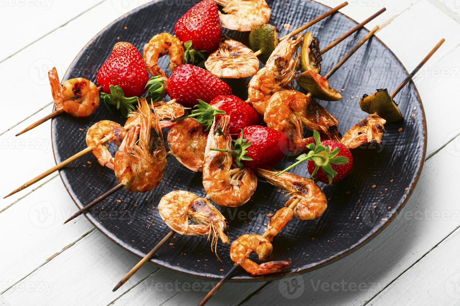 Delicious roasted prawns on a skewer photo