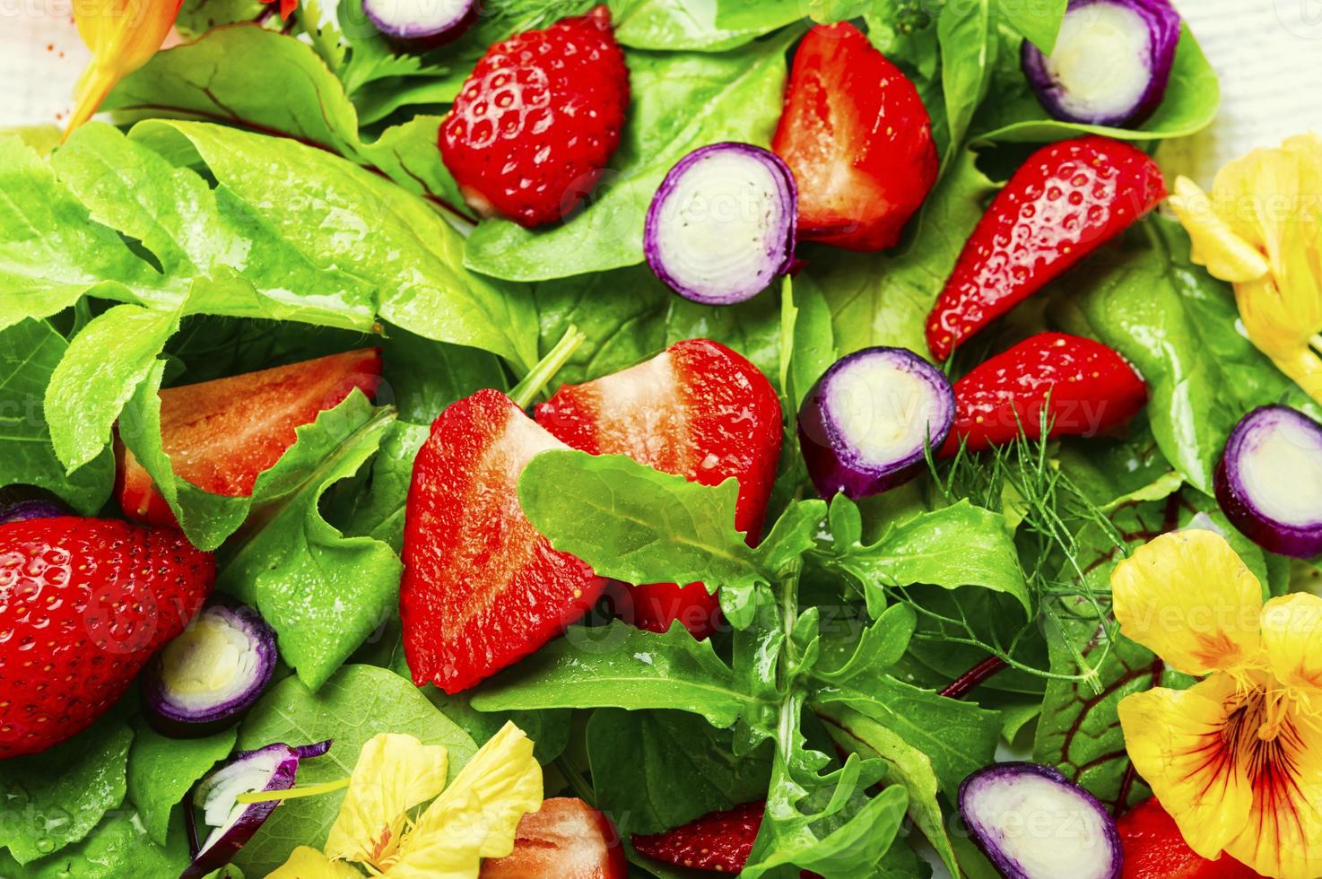 Summer salad with berries and herbs,close up photo